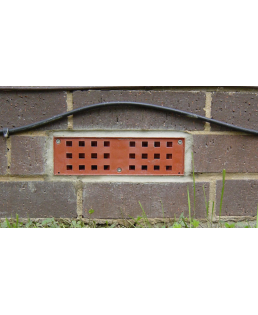 SMART Airbrick terre cuite scellée dans un mur de briques